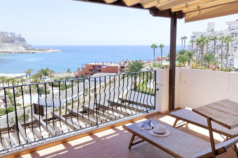 Each suite has a sea-facing terrace with two sun-loungers