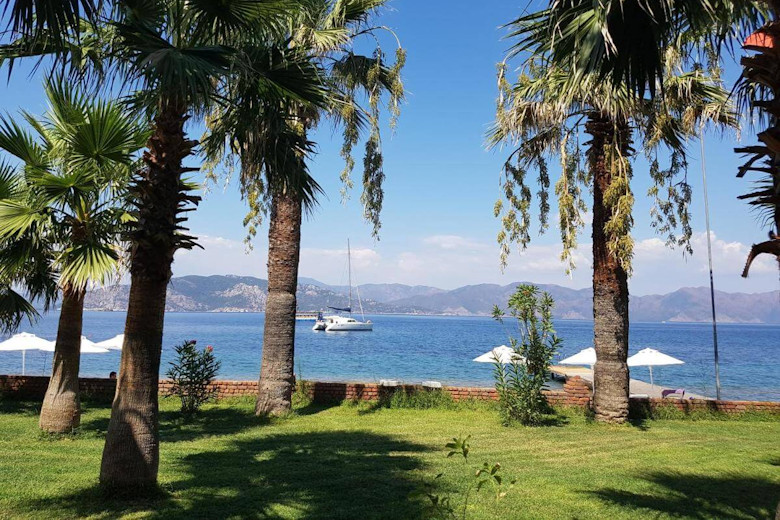 The hotel's gardens leading to the beach