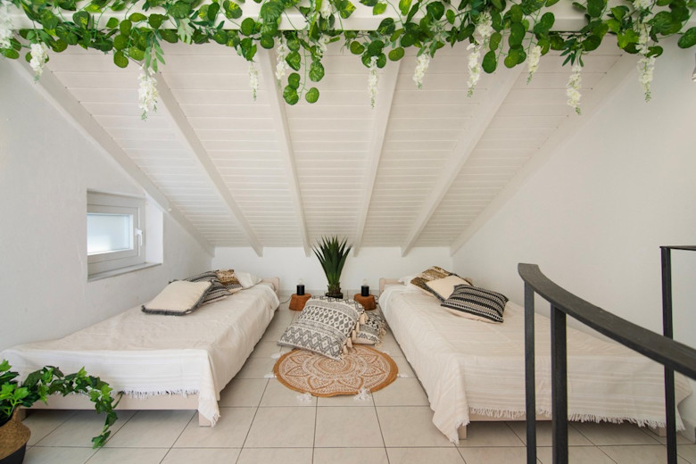 The attic bedroom in a Maisonette