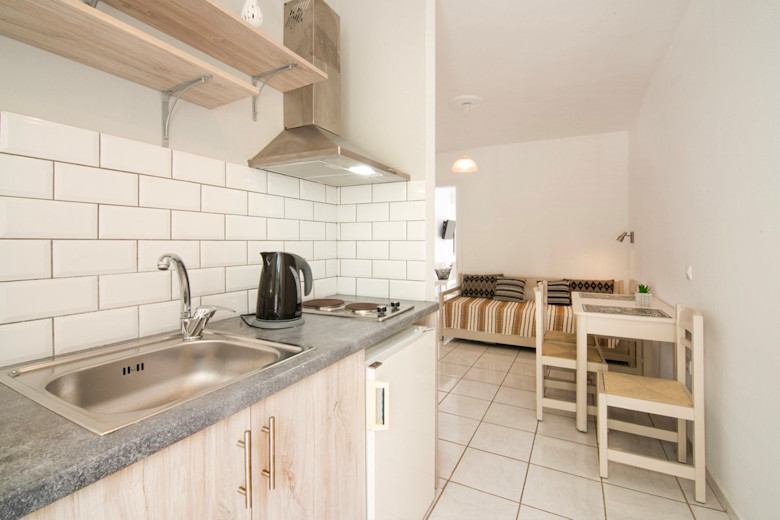 Kitchenette and living area in 2-bedroom Apartment